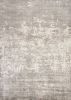 5' X 7' Beige And Ivory Abstract Hand Loomed Area Rug