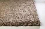 8' X 11' Beige Shag Hand Woven Area Rug