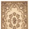 9' X 13' Beige And Brown Floral Medallion Area Rug
