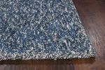 9' X 13' Indigo And Ivory Abstract Shag Hand Woven Area Rug
