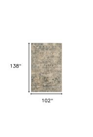 9' X 12' Beige And Blue Floral Medallion Hand Loomed Distressed Area Rug