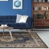 5' X 8' Navy Blue Gold And Ivory Medallion Area Rug