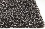 5' X 7' Black And White Shag Hand Woven Area Rug