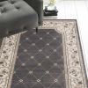 5' X 8' Gray And Ivory Floral Area Rug