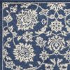 5' X 8' Blue And Ivory Floral Medallion Area Rug