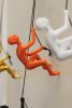6" X 3" Orange Resin Climbing Man Hanging Dimensional Sculpture