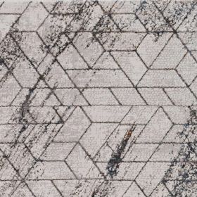 7' X 10' Ivory And Brown Geometric Area Rug