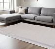 7' X 10' Ivory And Silver Abstract Area Rug