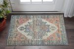 2' X 4' Blue Brick Red And Brown Jute Medallion Hand Woven Distressed Area Rug