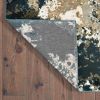 6' X 9' Ivory And Navy Blue Abstract Area Rug