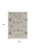 5' X 7' Ivory And Blue Floral Area Rug