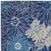 7' X 10' Blue And Ivory Floral Area Rug