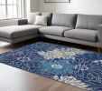 7' X 10' Blue And Ivory Floral Area Rug