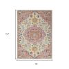 7' X 10' Pink And Ivory Southwestern Distressed Area Rug