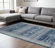 8' X 10' Navy Blue And Ivory Tribal Area Rug