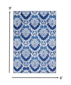 6' X 9' Blue And Ivory Damask Distressed Area Rug