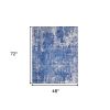 4' X 6' Blue And Ivory Abstract Distressed Area Rug