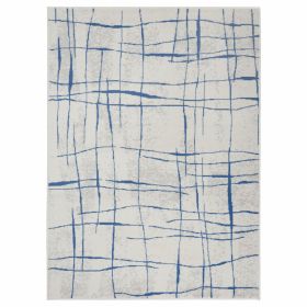 5' X 7' Ivory And Blue Geometric Distressed Area Rug