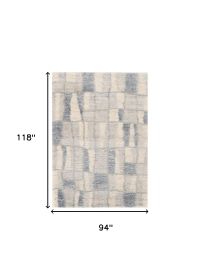 7' X 9' Ivory and Blue Area Rug